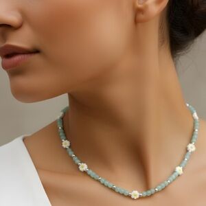 Elegant Beaded Necklace with Floral Accents